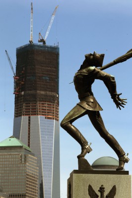 The Katyn monument is seen in Exchange Place as construction continues on One World Trade Center in the distance, on April 30, 2012, as seen from Jersey City, N.J.