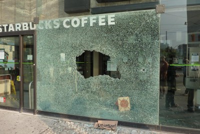 2010: The damaged front of a Starbucks restaurant in Toronto during G20 summit