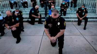 200601095755-police-coral-gables-florida-kneel-solidarity-protesters-george-floyd-super-tease.jpg