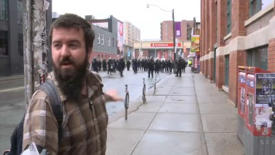 Blocked from joining Queen Street West protest by row of police