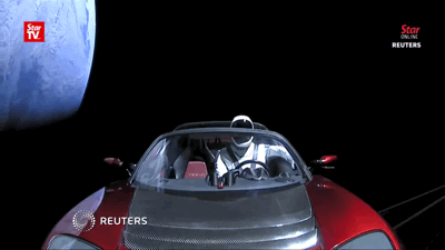 Tesla Roadster floating through space.gif