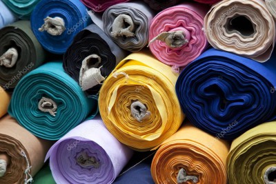 depositphotos_151677340-stock-photo-colourful-fabric-rolls-760008301.jpg