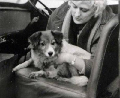 Myra Hindley with her dog, Puppet, pictured in a private photo album, seized by police